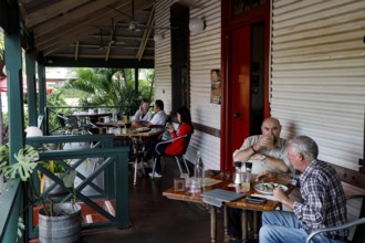 Visitors enjoy drinks and snacks on the veranda of Matso's Broome Brewery, Broome, Western