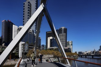 View of Melbourne's skyline from Sandridge Bridge under clear sky, Melbourne, Victoria, Australia