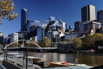 Melbourne skyline during the day with views of the Yarra River and Sandridge Bridge, Melbourne,