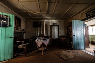 Living room with antique furniture and rustic charm, zero