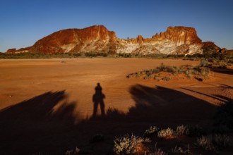 Dark shadows against the contrasting landscape of Rainbow Valley when the sun is low, Rainbow