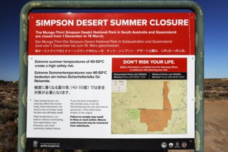 Warning sign describes summer closure in Simpson Desert, Simpson Desert, Australia