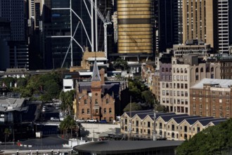 Historic brick architecture surrounded by modern skyscrapers in the city, Sydney, New South Wales,