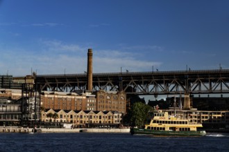 Former warehouses and bridge on Sydney Harbour, Sydney, NSW, Australia