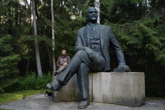 Lenin monument in Grutas Park in Druskininkai, surrounded by forests, Druskininkai, Lithuania