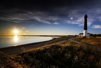 Lighthouse on the Särve peninsula at dusk with a view of the beach, Särve, Estonia