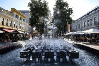 Lively fountain on Laisves aleja in sunny weather, Kaunas, LT