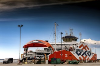 Ferry at a port on Muhu Island under clear skies, Muhu, Estonia
