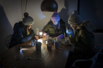 Symbolic blackout, extensive, prolonged power failure, in private surroundings, without