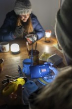 Symbolic blackout, extensive, prolonged power failure, in private surroundings, without