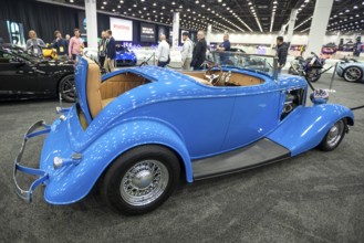 Detroit, Michigan USA - 14 January 2026 - A Ford 'Tool Time' roadster with a rumble seat on display