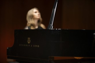 Young woman, pianist playing on a Steinway & Sons grand piano, Stuttgart, Baden-Württemberg,