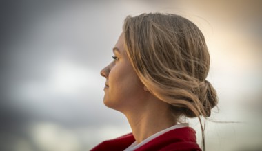 The face of a young woman in profile, in the evening light, Stuttgart, Baden-Württemberg, Germany