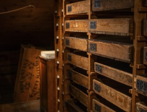 Old wooden cabinet with numbered drawers for storing match labels, Tändsticksmuseet matchstick