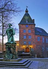 Moers Castle with the monument to Electress Louise Henriette of Brandenburg early in winter, Moers,