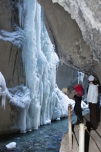 Photographer in the Partnachklamm gorge near Garmisch-Partenkirchen, icicles, Werdenfelser Land,