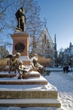 Snowy angel, figure at the Felix Mendessohn Bartholdy monument in winter with snow, Leipzig St.
