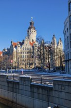 Pleißemühlgraben in front of the New Town Hall, monument by Hugo Licht, in winter with snow,