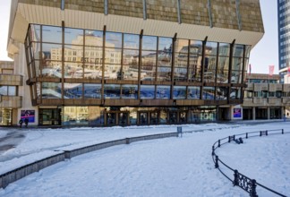 Gewandhaus façade with reflection of Augustusplatz in winter with snow, Leipzig, Saxony, Germany