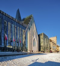 University of Leipzig, lecture hall building and Paulinum on Augustusplatz in winter with snow,