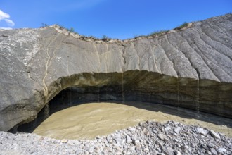 Meltwater at a glacier cave, underground glacier stream, Castner Glacier, Delta Range, Alaska