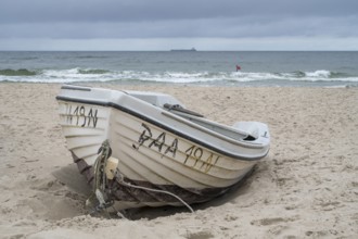 Boat located on sandy beach, Rote Flagge am UIfer, Baltic resort Göhren, Baltic Sea, Rügen island,