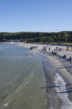 Tourists on the beach in autumn, Binz, seaside resort, Rügen island, Baltic Sea,
