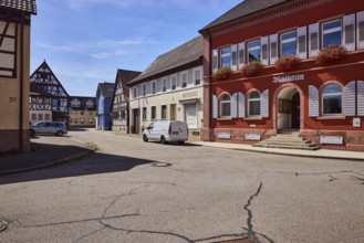 Grafenhausen Town Hall, façade with windows, shutters and cellar hatches, stairway, flower boxes,