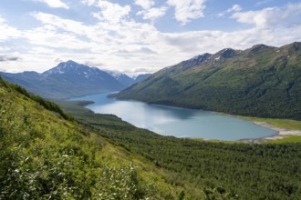 View of blue lake and mountains on Twin Peaks Trail, Eklutna Lake, Chugach Mountains, Chugach State