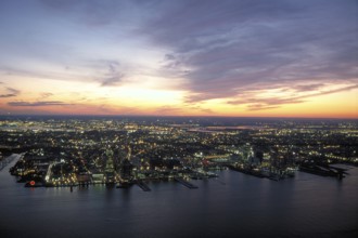 The lights of New York City in the evening from the plane, USA