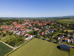 Summer village landscape with red roofs and surrounding fields, Adenstedt, Ilsede municipality,