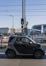 Berlin road traffic with buses, trams and pedestrians at and around the main train station, Berlin,
