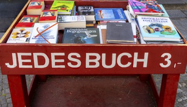 Sales stands in front of a Thalia bookstore in downtown Potsdam, Brandenburg, Germany