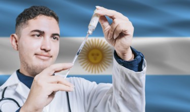 Doctor holding syringe on Argentina flag background. Medical professional holding syringe with