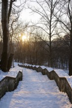 Snow-covered staircase with evening sun in Volkspark Friedrichshain on 07.01.2026