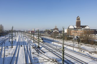 An ICE runs on the railway line next to the BEHALA (Berliner Hafen- und Lagerhausgesellschaft) on