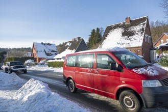 Snowy road, cars, houses, winter, snow, Sieversen, Samtgemeinde Rosengarten, Lower Saxony, Germany