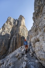 Climbers on the Via Ferrata Bocciere Centrale via ferrata, spectacular mountain landscape with