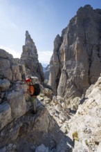 Climbers on the Via Ferrata Bocciere Centrale via ferrata, spectacular mountain landscape with