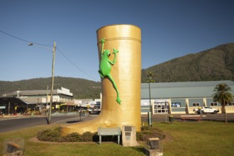 Famous giant boot monument and tourist landmark on a bright sunny day. Golden Gumboot, Tully,