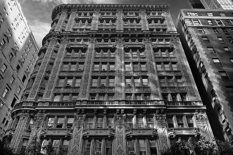 Decorative high-rise building facade, black and white, New York City, USA
