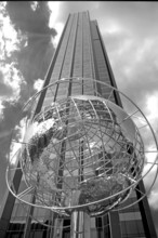Globe sculpture in front of the Trump International Hotel in Central Park, black and white, New