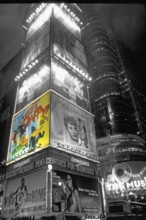 Illuminated advertising on Time Square at night, black and white, New York City, USA