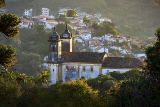 Church and historic city of Ouro Preto seen through the vegetation, Ouro Preto, Minas Gerais,