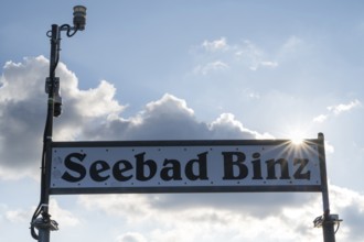 Sign Seebad Binz on the pier, back light with sun star, Binz, seaside resort, Rügen island,