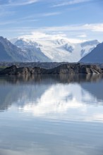 Mountain landscape reflected in glacial lake, Mount Blackburn and Kennicott Glacier, McCarthy Road,