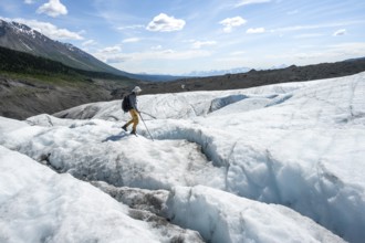 Climbers on the ice of Root Glacier, Wrangell St. Elias National Park, Alaska, USA