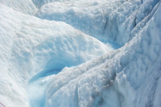 Waterfall in a crevasse on the ice of Root Glacier, Wrangell St. Elias National Park, Alaska, USA