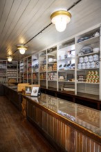 Interior view, historic restored Kennicott shopping store with historic goods display, retro food