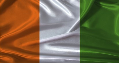 National flag of Ivory Coast with cloth texture. Ivory Coast flag with realistic texture background